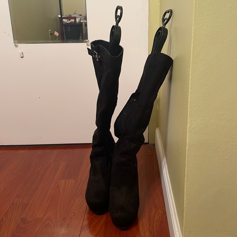 DSW Black heel boots. Never worn. Does not come with original box.